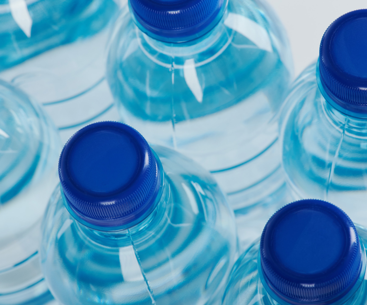 Group of blue plastic bottles above top view close up Group of blue plastic bottles above top view close up<br />